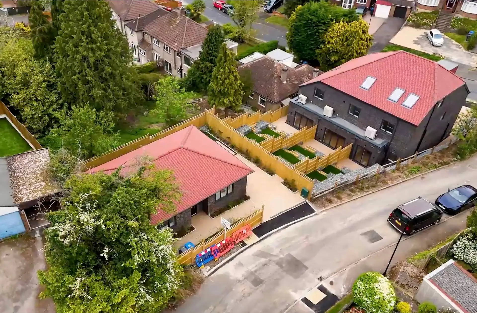 Aerial view of the terrace and the detached bungalow at Waddington Way